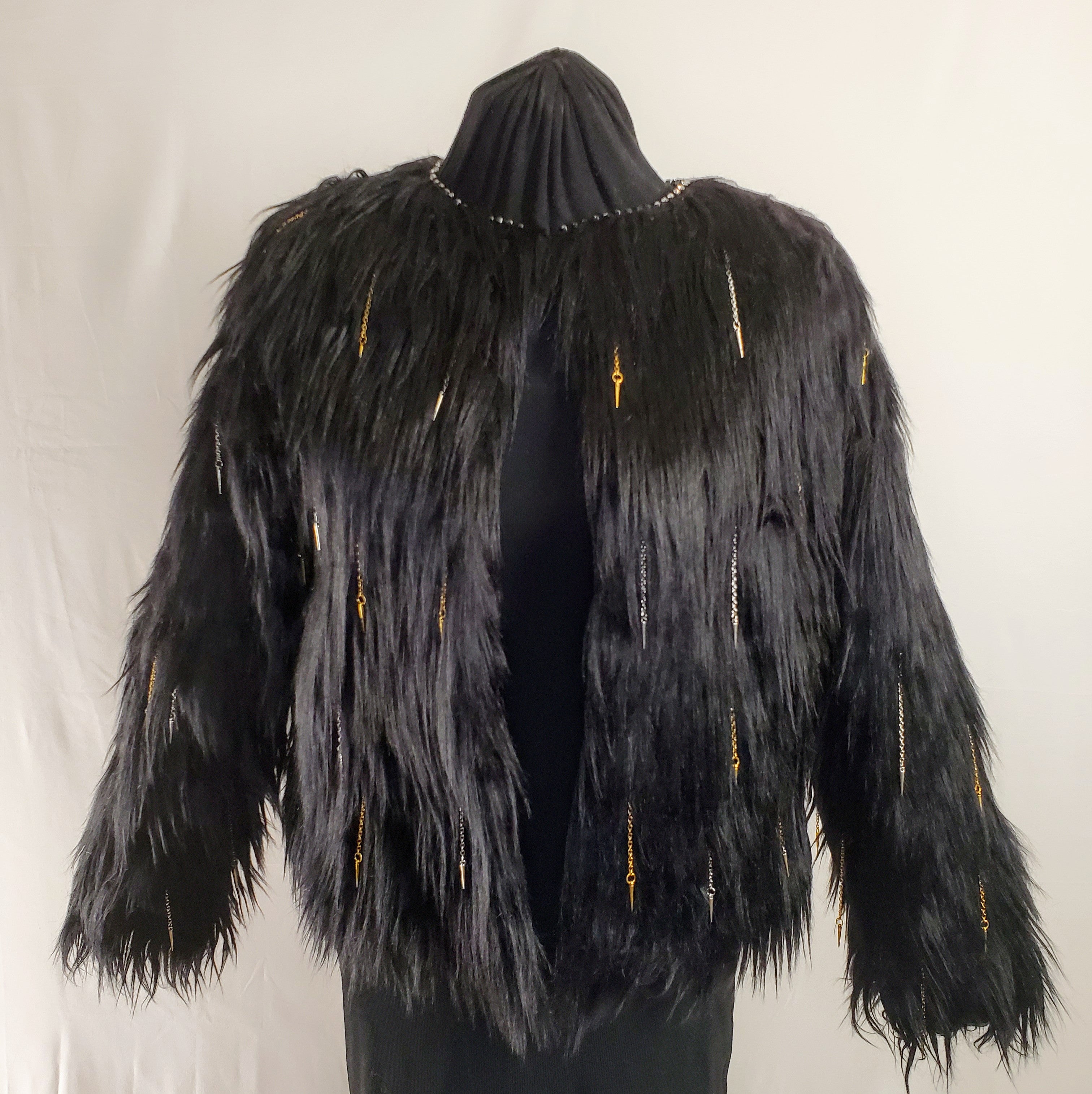 faux fur black coat with chain and spike details front view
