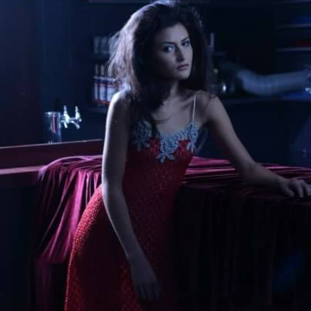 Side view of Red and Silver Crochet Dress on model