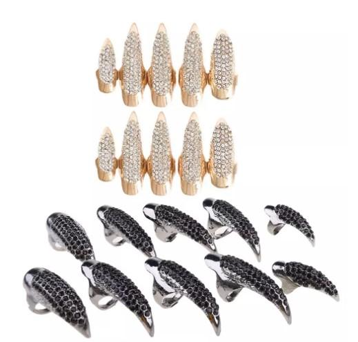 Gold and Silver rhinestone finger tip rings on white background