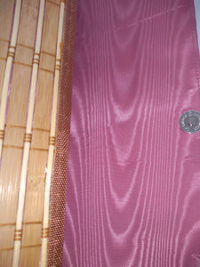 beige wood clutch with pink moiré watermark tafetta lining. Inside view