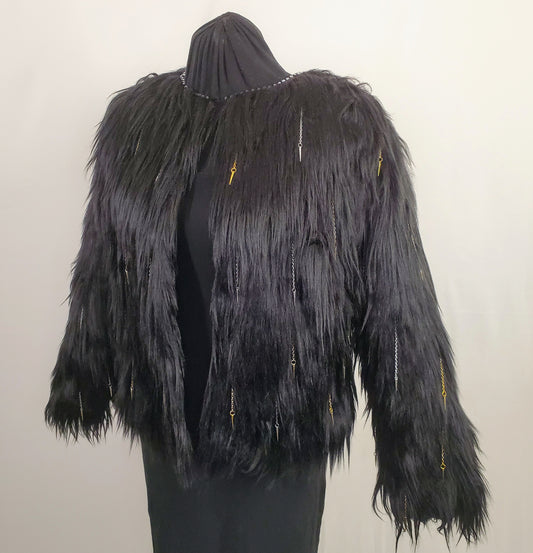 faux fur black coat with chain and spike details side view