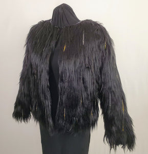 faux fur black coat with chain and spike details side view