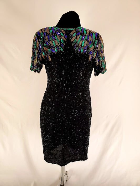 front view of 80s Peacock Beaded Cocktail Dress on mannequin