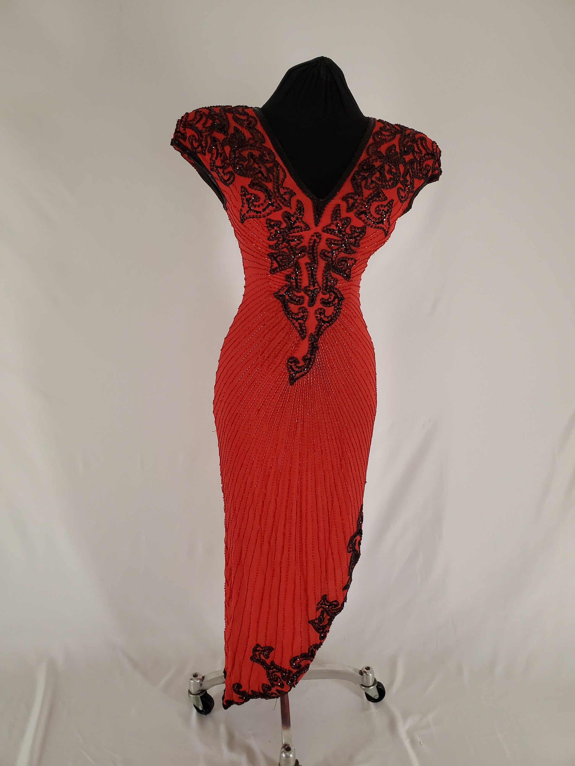 Front view of red and Black Sequin Gown