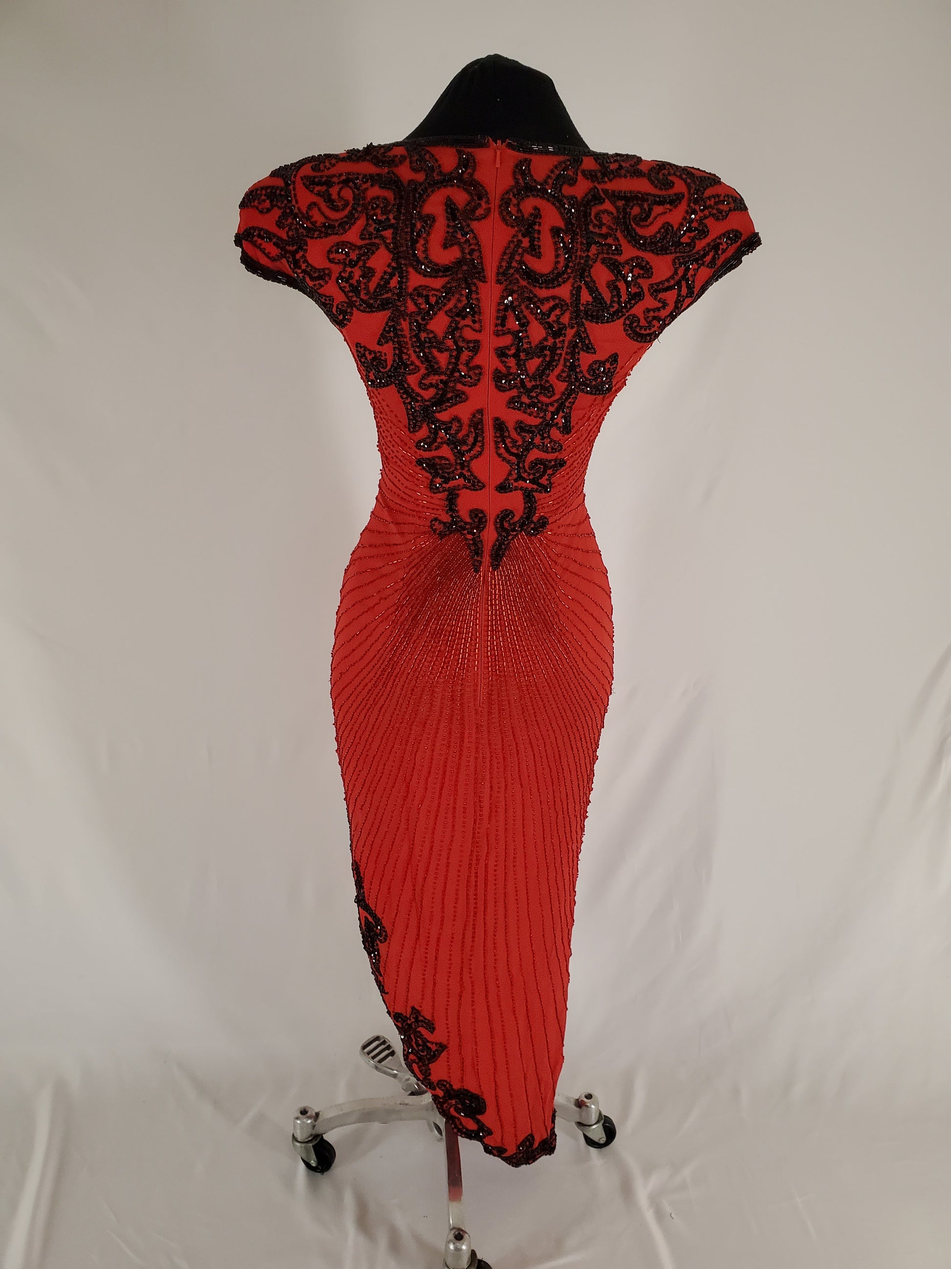 Back view of red and Black Sequin Gown
